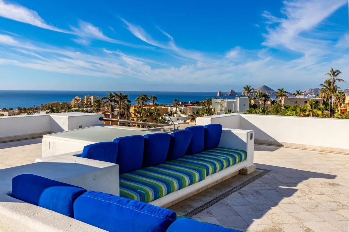 U-shaped rooftop sofa looking over Cabo San Lucas to the sea